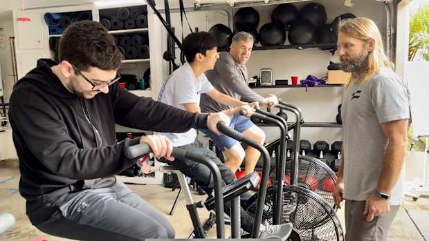 C9 Jack and Fudge on exercise bikes